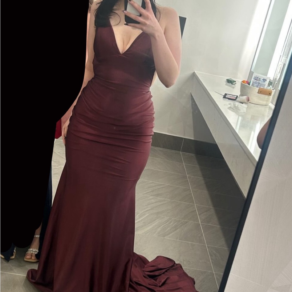 Jessica Angel 2415, backless burgundy prom dress with a train in the back